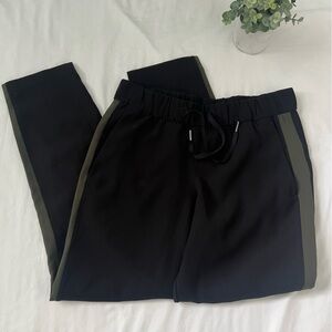 Lululemon On The Fly Pant Woven *Track Stripe
Black / Dark Olive Size 6